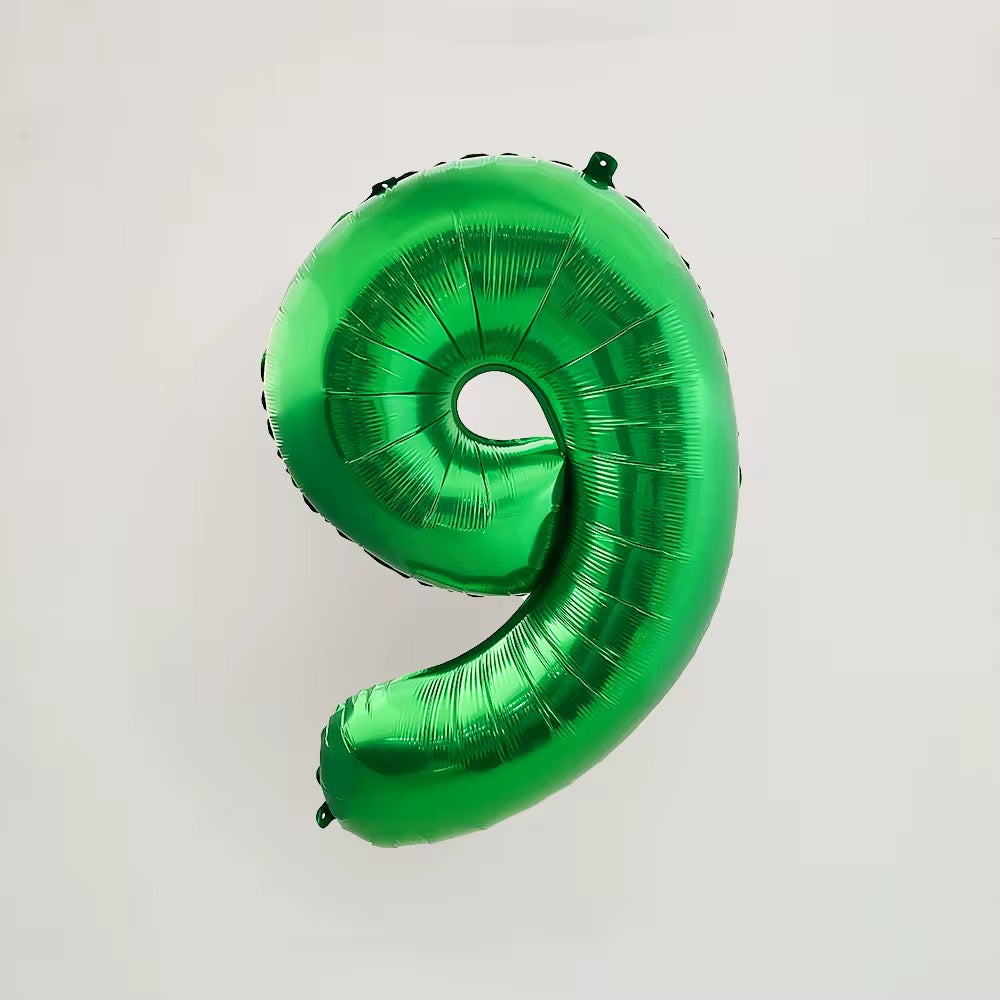 Green number balloons