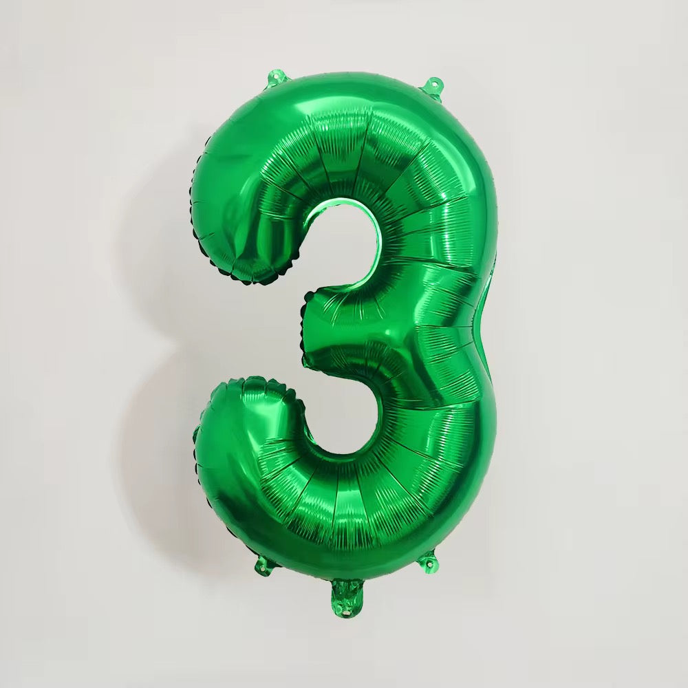 Green number balloons